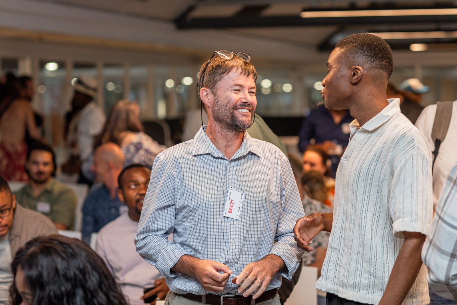 Founders attending a community gathering